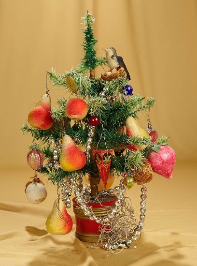 16" German "new growth" goose feather tree with glass and cotton wrap ornaments. $200/400