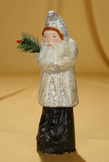 9.5" German paper mache Belsnickel candy container in white robe. $300/500