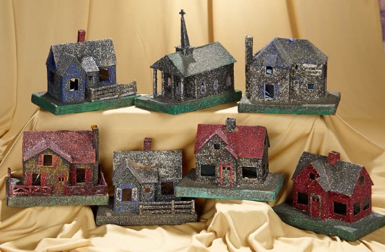 Grouping of seven Christmas model train Garden Putz Houses by M&K Products. $200/400