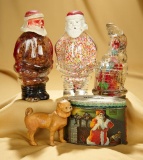 Group of antique Christmas candy containers and bank. $200/300