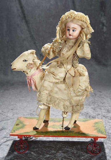 19"h. Wonderful French mechanical pull toy "Little Shepherdess and Lamb". $1400/1800