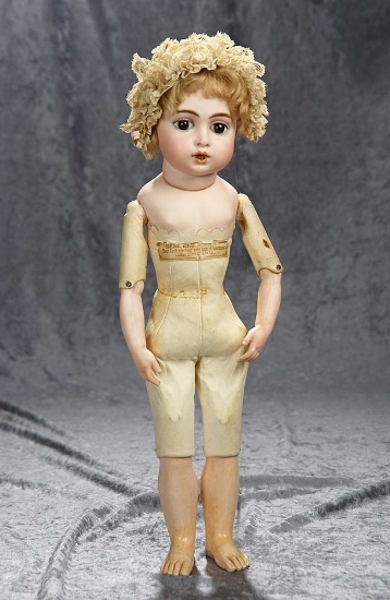 18" French bisque Bebe Teteur by Leon Casimir Bru with original labeled body. $7500/9500