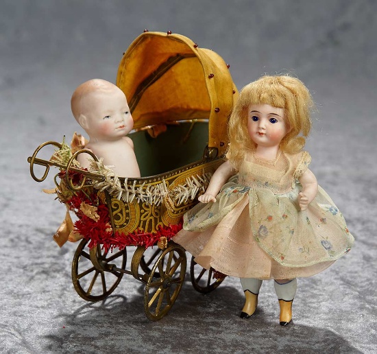 6" German all-bisque doll with tin carriage and all-bisque Bye-lo. $500/750