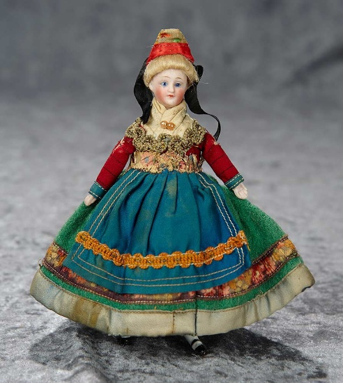 6" German bisque miniature doll with original folklore costume. $300/500