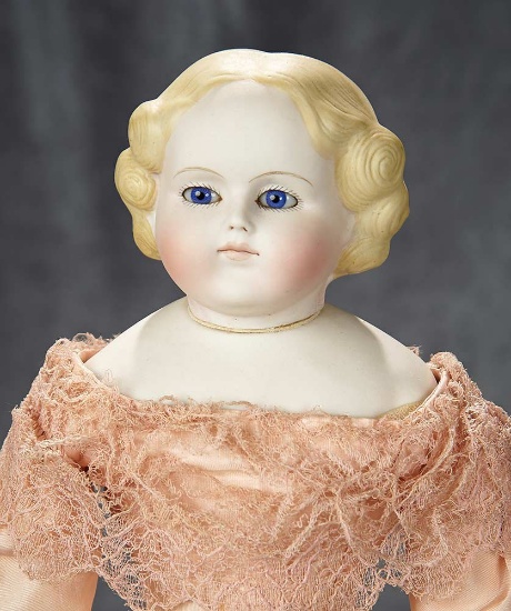 18" German bisque doll with swivel head, sculpted hair and rare glass eyes. $800/1000