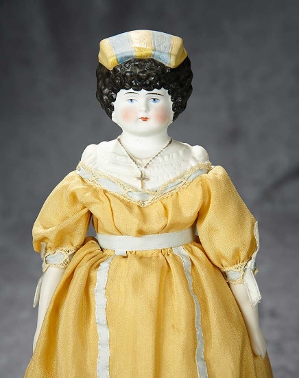 14" German bisque doll with unusual sculpted black hair and cap. $300/500