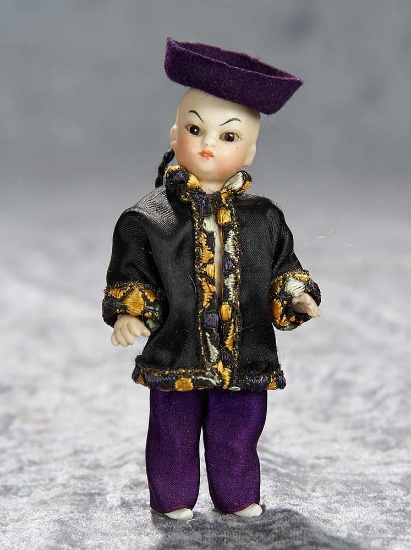 5" German all-bisque miniature doll depicting Asian child. $400/600