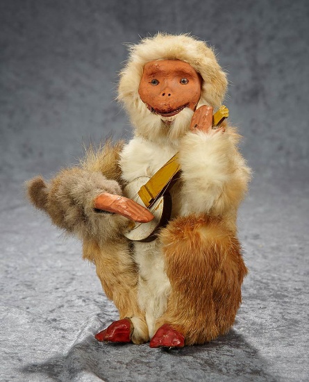 11" French musical  mechanical toy "Monkey with Banjo" by Roullet et Decamps. $1200/1600