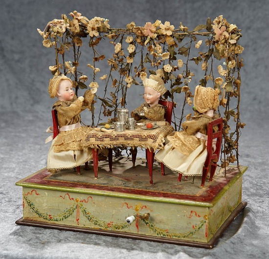 German musical toy "A Trio of Children Taking Tea in the Garden" Zinner and Sohne. $1800/2100