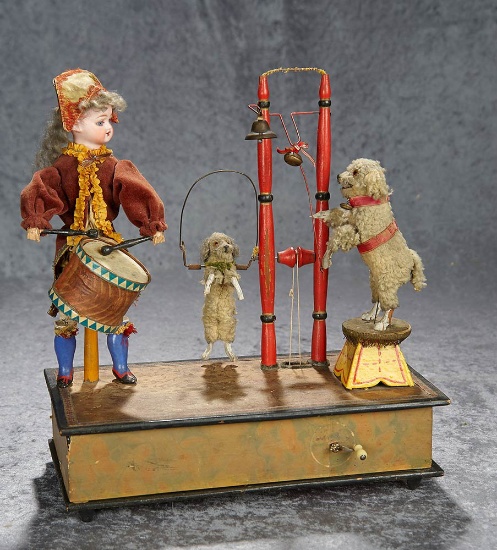 13"h. German musical handwind toy "The Performing Puppies" by Zinner and Sohne. $1200/1600