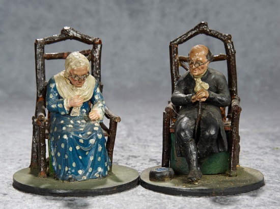 7" Pair, German paper mache seated grandmother and grandfather as "nodders". $400/500