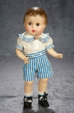 American composition wide-eyed character doll with original costume. $200/400