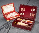 Two German bisque miniature dolls in original presentations. $300/500