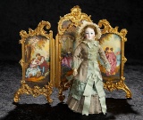 Petite French Bisque Poupee with Enigmatic Smile and Cobalt Eyes 1600/2100