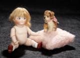 Impish German All-Bisque Miniature Googly with Jointed Elbows and Knees 2300/3200