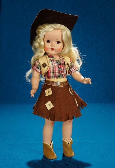 19" American hard plastic child doll in wonderful cowgirl costume, near mint. $100/200