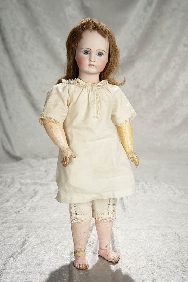 18" Sonneberg bisque closed mouth doll,serene expression, rare original wooden body. $1400/1800