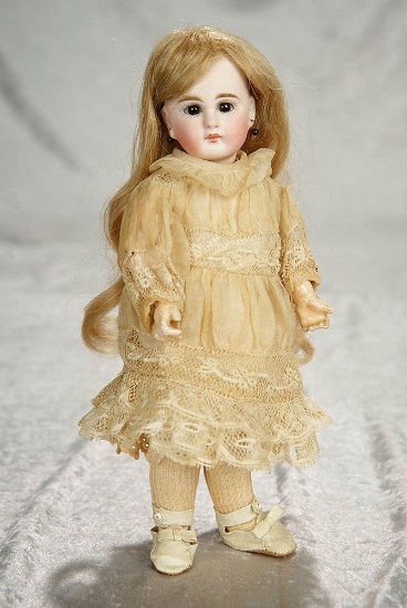 Very dear 10" Sonneberg bisque closed  mouth child doll, model 137, by mystery maker. $800/1100