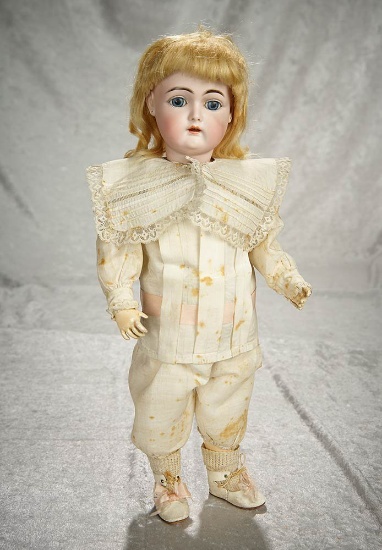 17" German bisque child doll, rare markings, model 209, original body, costume and wig. $400/500