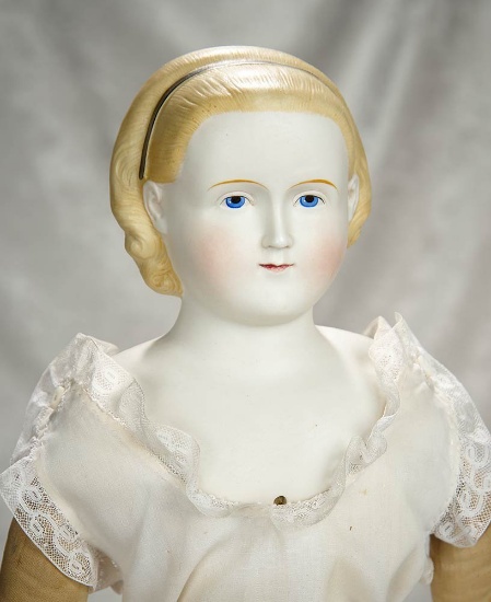 24" German bisque doll with blonde sculpted hair known as "Alice in Wonderland". $500/$700