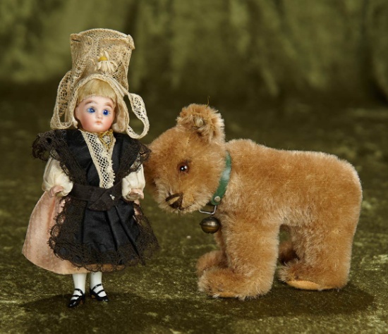 5" German all-bisque miniature doll in lavish Normandy costume. $300/400