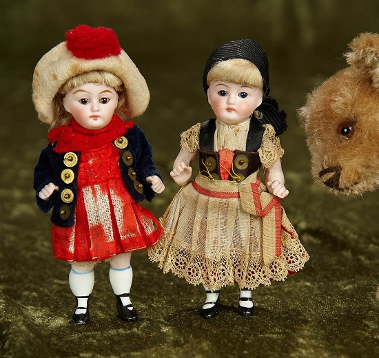 Pair, 5" German all bisque dolls with original factory costumes. $300/500
