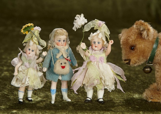 Trio of 3"-4" German all-bisque dolls with wonderful costumes. $300/400