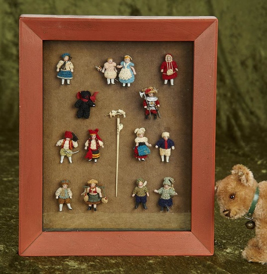 Collection of tiny German all-bisque dolls in original costumes. $300/400