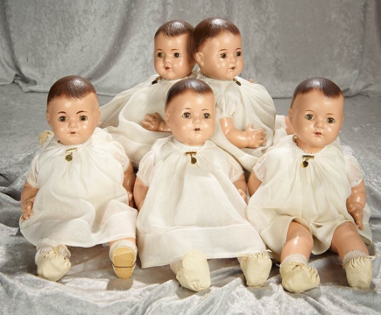 Complete set. American composition "Dionne Quintuplets" with original tagged costumes. $700/900