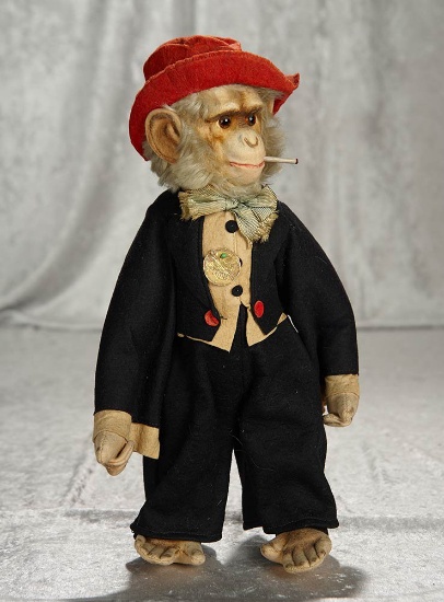 15" German felt character Monkey with glass eyes, cigarette, original costume. $200/400