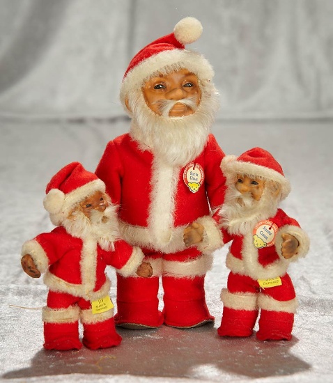 5" - 7 1/2" Three German Santa Clauses in original costumes by Steiff, original tags. $400/500