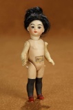 German Amber-Tinted Bisque Asian Child with Black Stockings 400/600