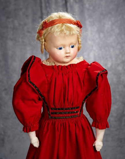 26" German wax over paper mache doll with fancily painted boots and original costume. $300/500