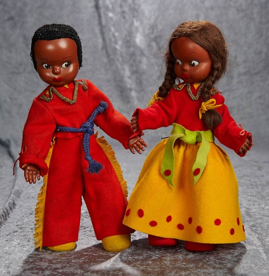 Pair of 14" French celluloid dolls by Urika in original costumes. $400/500