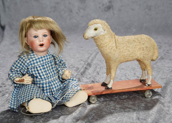 10" French bisque character, 251, by SFBJ with little pull-toy lamb. $500/700