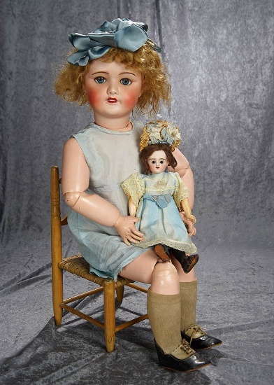 31" French bisque bebe 301, by SFBJ with her own little bisque doll. $400/500