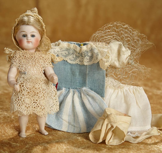 5" Fine German all-bisque miniature doll with bare feet, costumes, by Kestner. $800/1000
