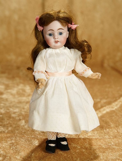 9" German bisque child, model 143, by Kestner in rare tiny size. $300/400