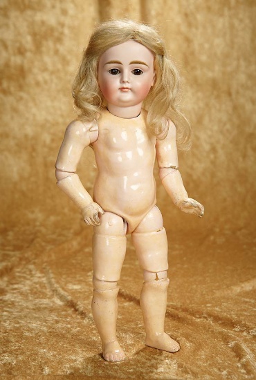 14" Gentle-faced German bisque closed mouth child, model X, by Kestner, original body. $1100/1300