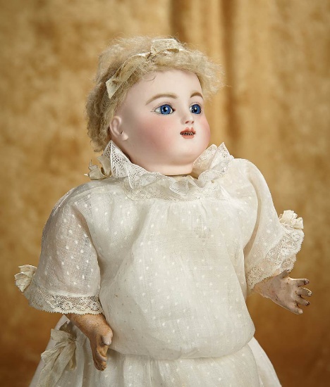 18" French Bisque Bebe Gigoteur by Jules Steiner in beautiful antique costume. $1200/1600