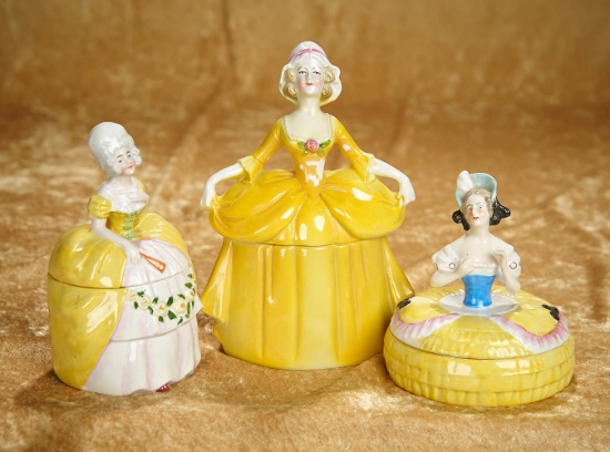 5"-8". Three German porcelain powder boxes depicting 18th century women. $300/400