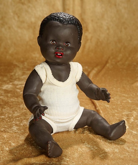 17" English black-complexioned character doll with original signed undergarments. $400/500
