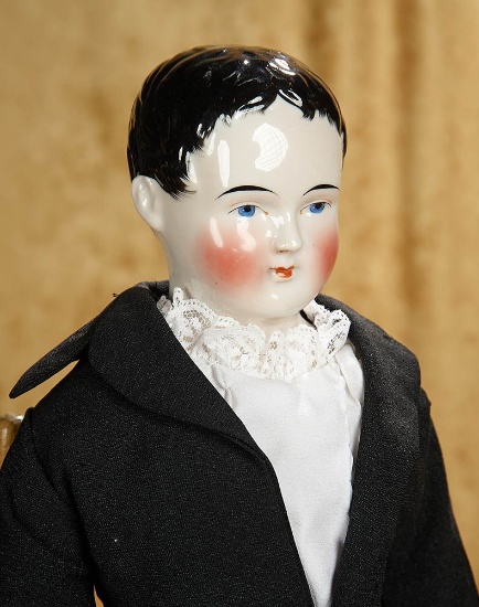 26" German porcelain doll depicting gentleman with short sculpted hair. $500/700