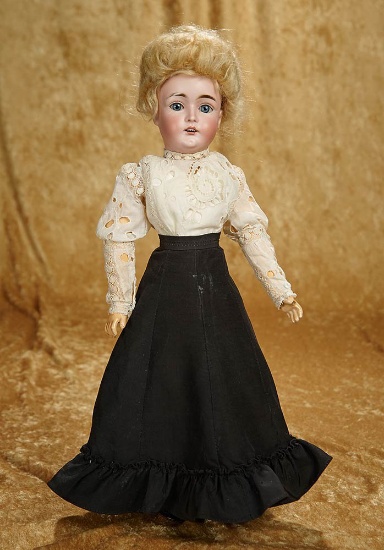 17" German bisque doll, model 162, by Kestner with original lady body and original wig. $800/1100