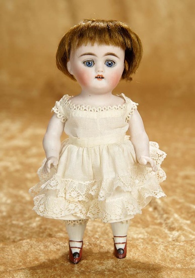 7 1/2" German all-bisque miniature doll by Kestner. $200/300