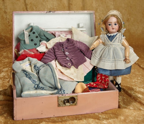 11" French bisque doll in the Bleuette genre with extensive wardrobe. $600/800
