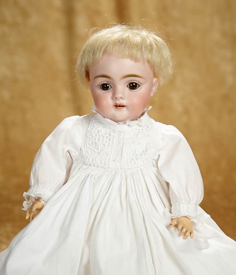 12" German bisque child, 143, by Kestner with family original multi-layered costume. $400/500