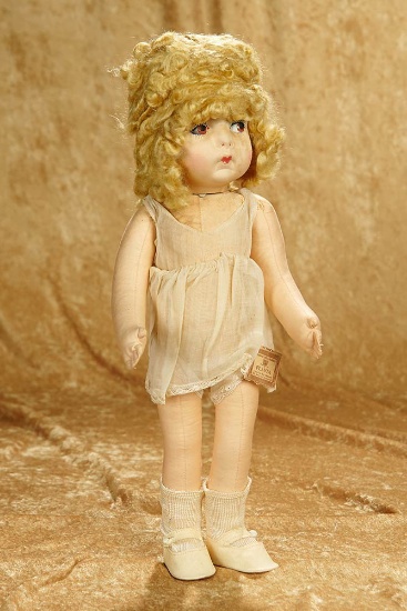 17" French cloth doll with original wig and original paper label "Flavia". $300/500