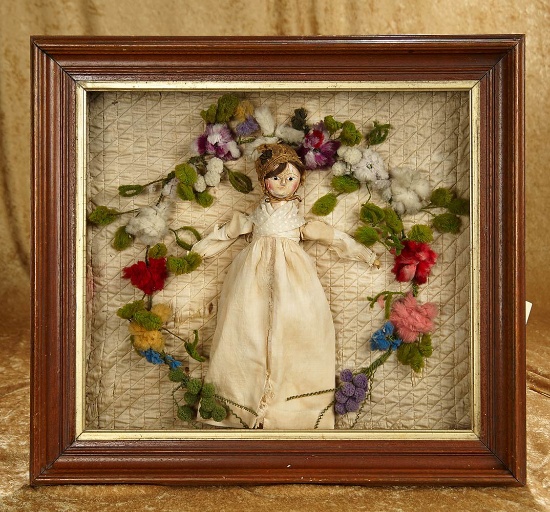 12" Early English wooden doll with enamel eyes in early shadowbox arrangement. $1400/1900