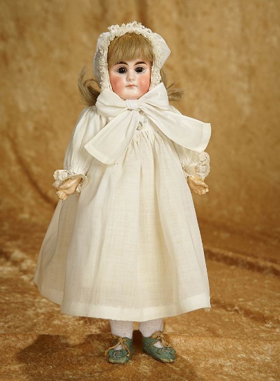 13" Sonneberg bisque doll with closed mouth by mystery maker. $600/800